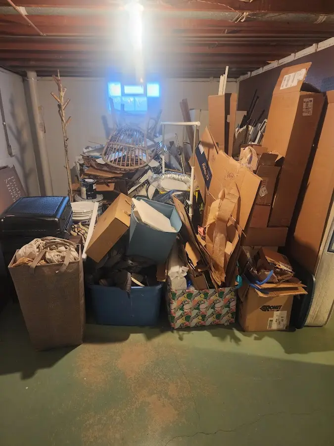 Roll-off dumpster container at job site for 20 Yard Dumpster Rental in Hamilton